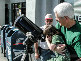 SIdewalk Telescope - young girl